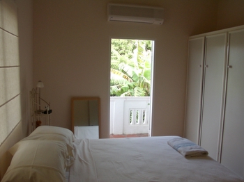 Master Bedroom looking to balcony.